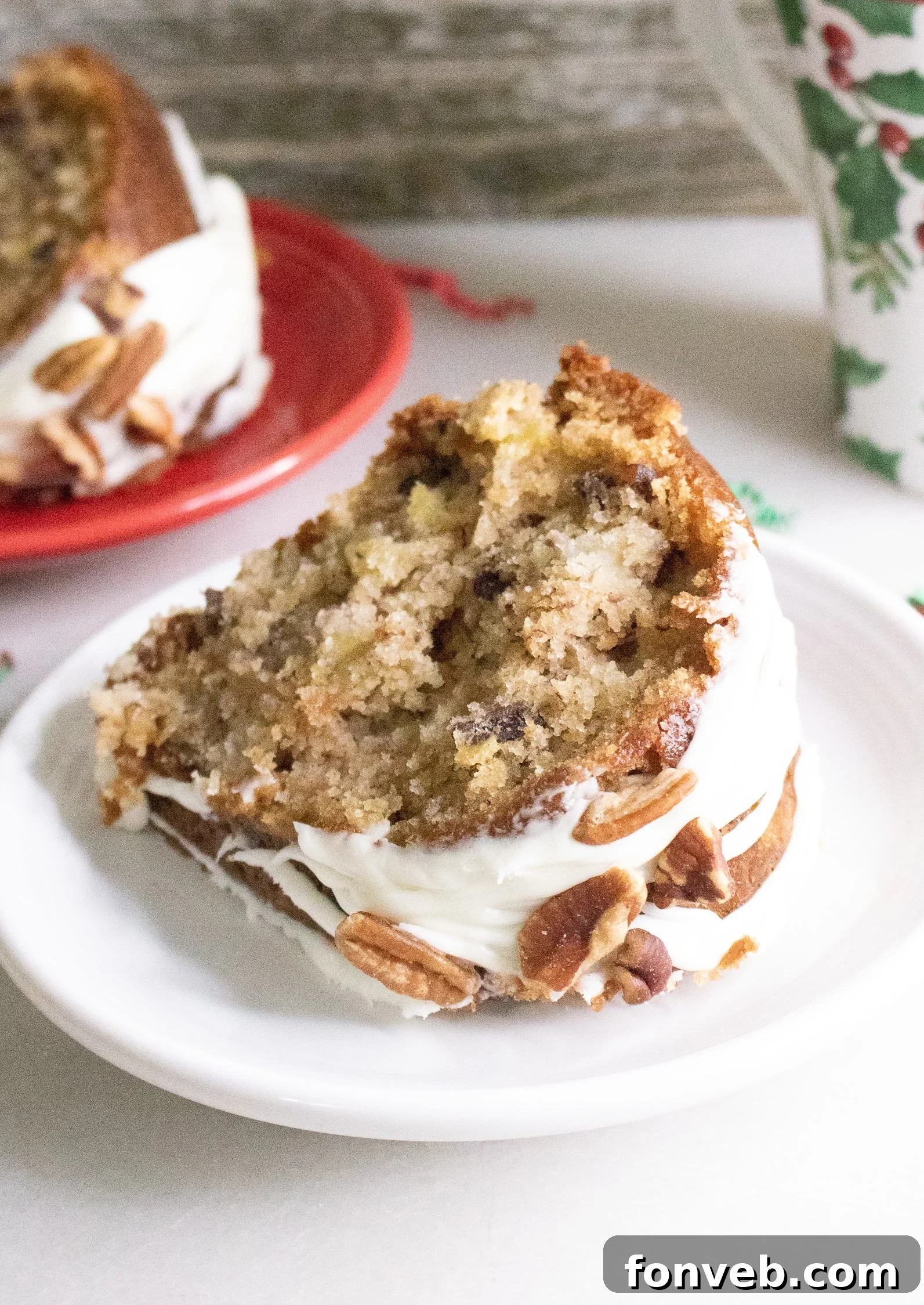 Overhead view of a Southern Hummingbird Bundt Cake with a generous dusting of powdered sugar, ready for serving