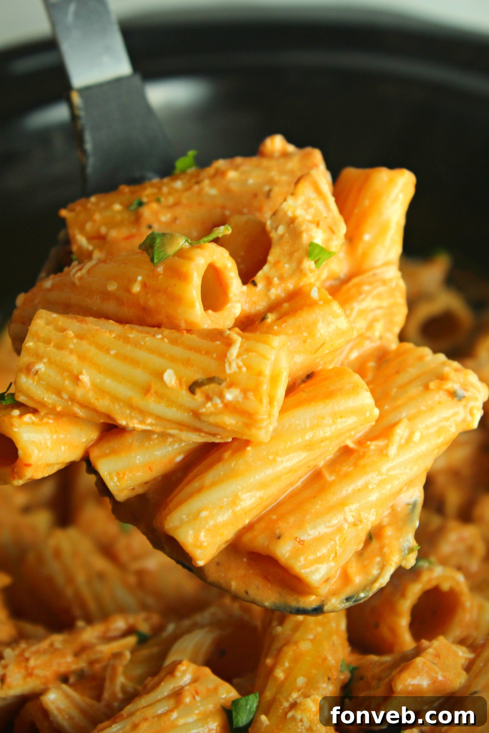 Velvety Slow Cooker Chicken Rigatoni 5 Another angle of the creamy chicken rigatoni, showing the steam and inviting texture.