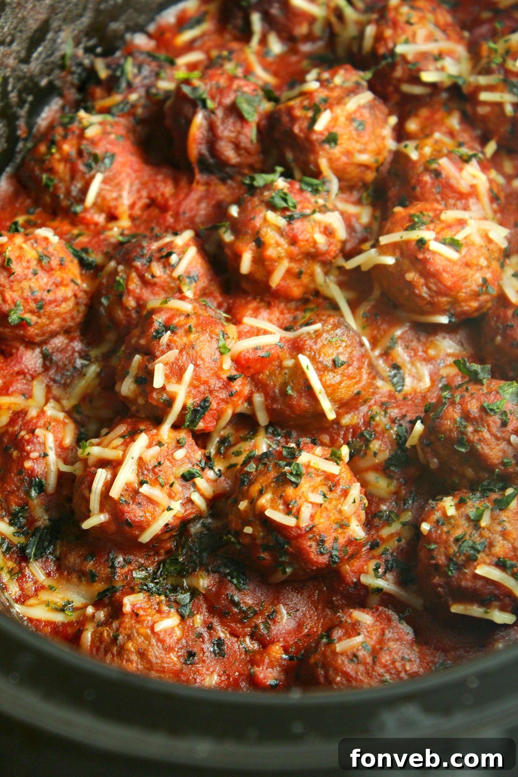 Slow cooker meatballs and sauce in a bowl