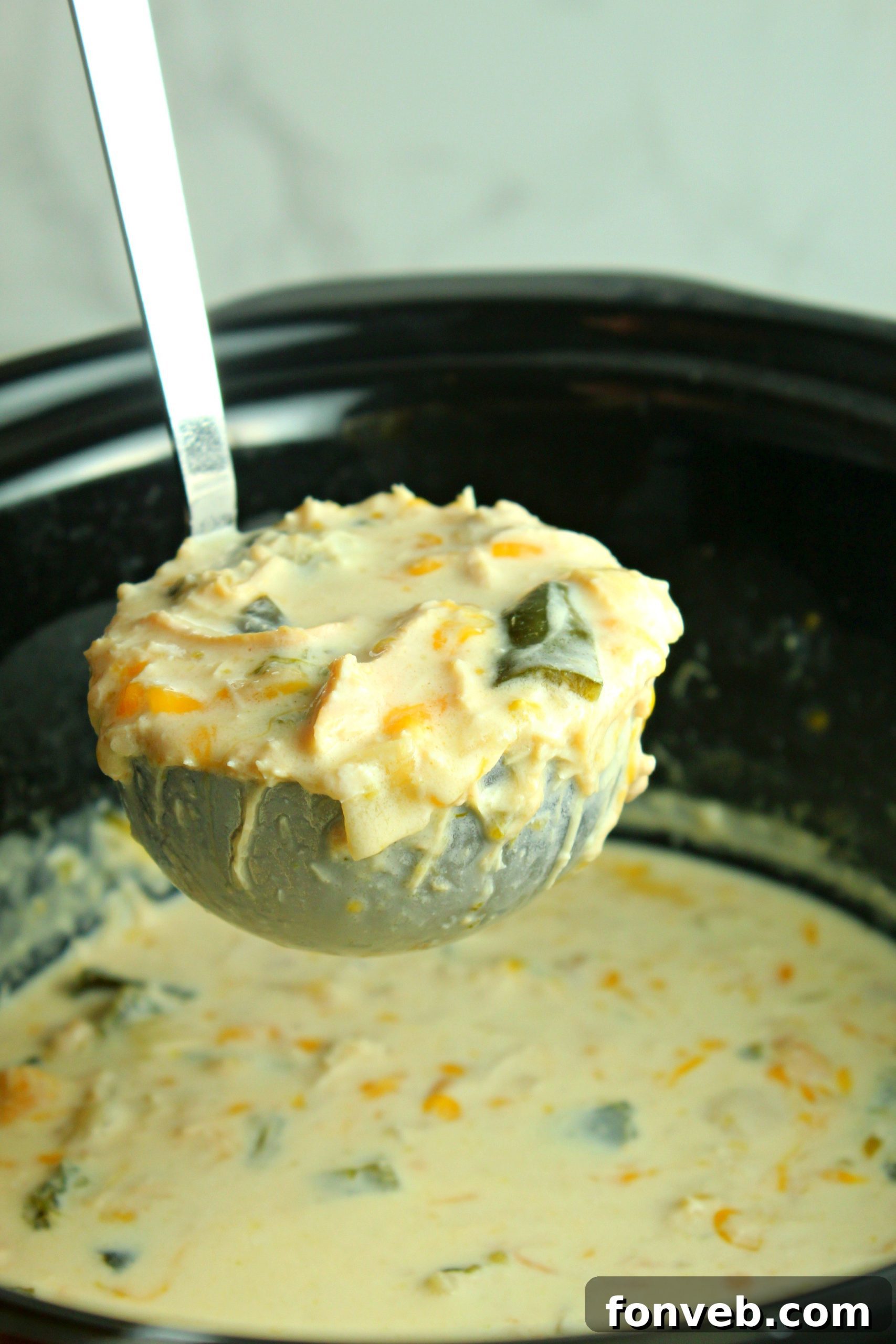 Delicious Slow Cooker Chicken Chile Rellenos Soup in a bowl