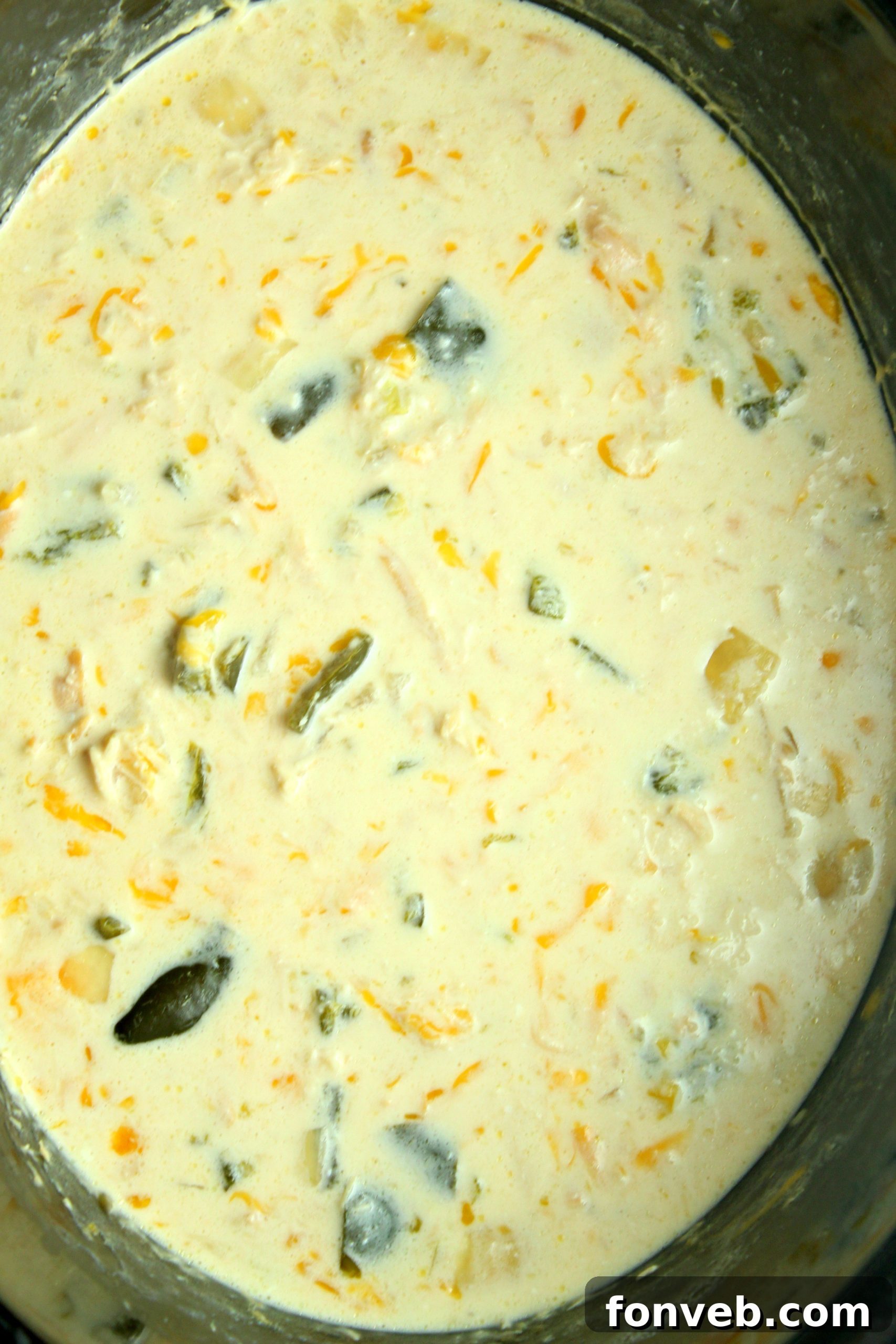 Ingredients for Slow Cooker Chicken Chile Rellenos Soup laid out on a counter