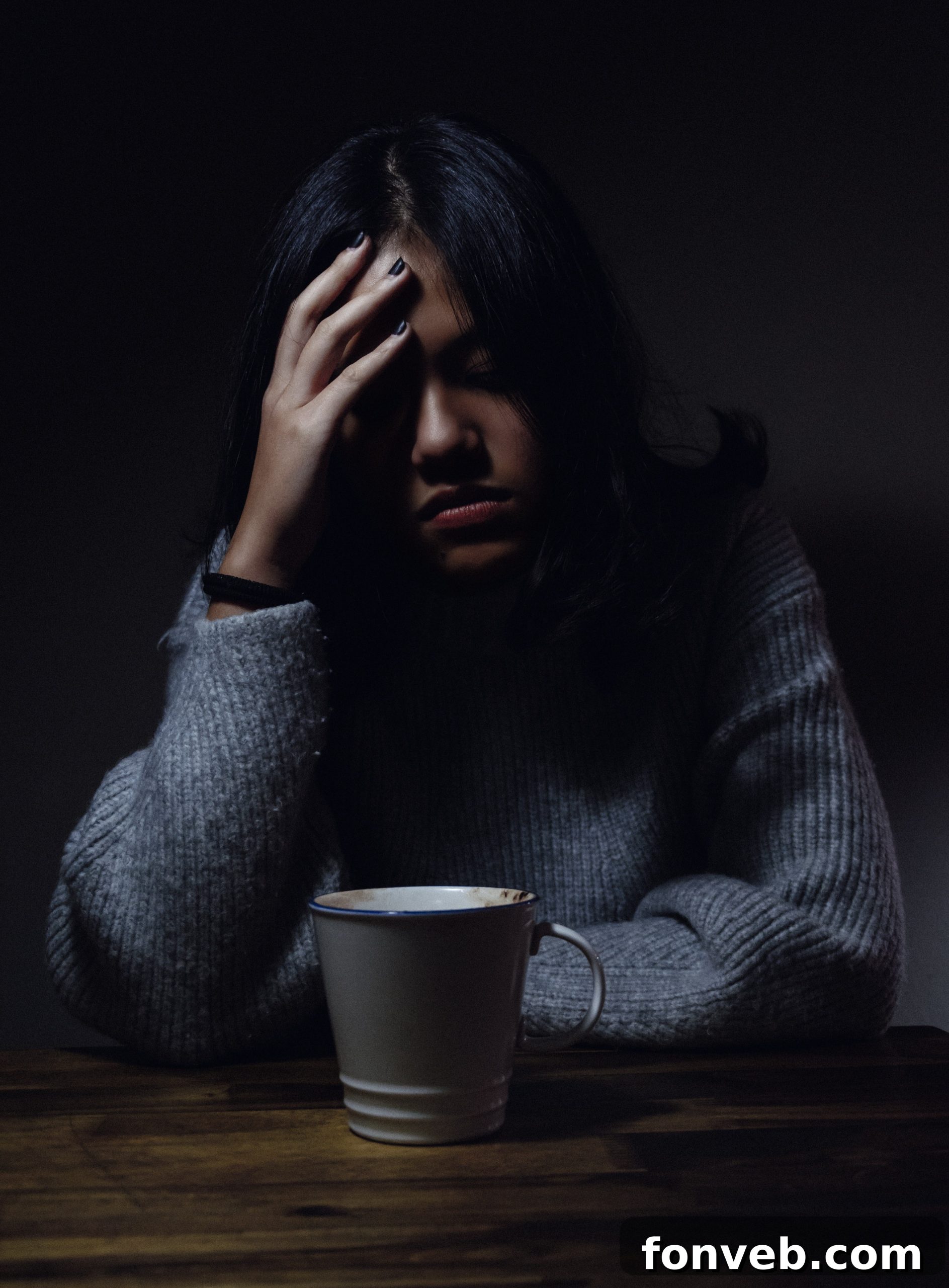 A thoughtful woman looking distressed, suggesting a need for her partner to listen.