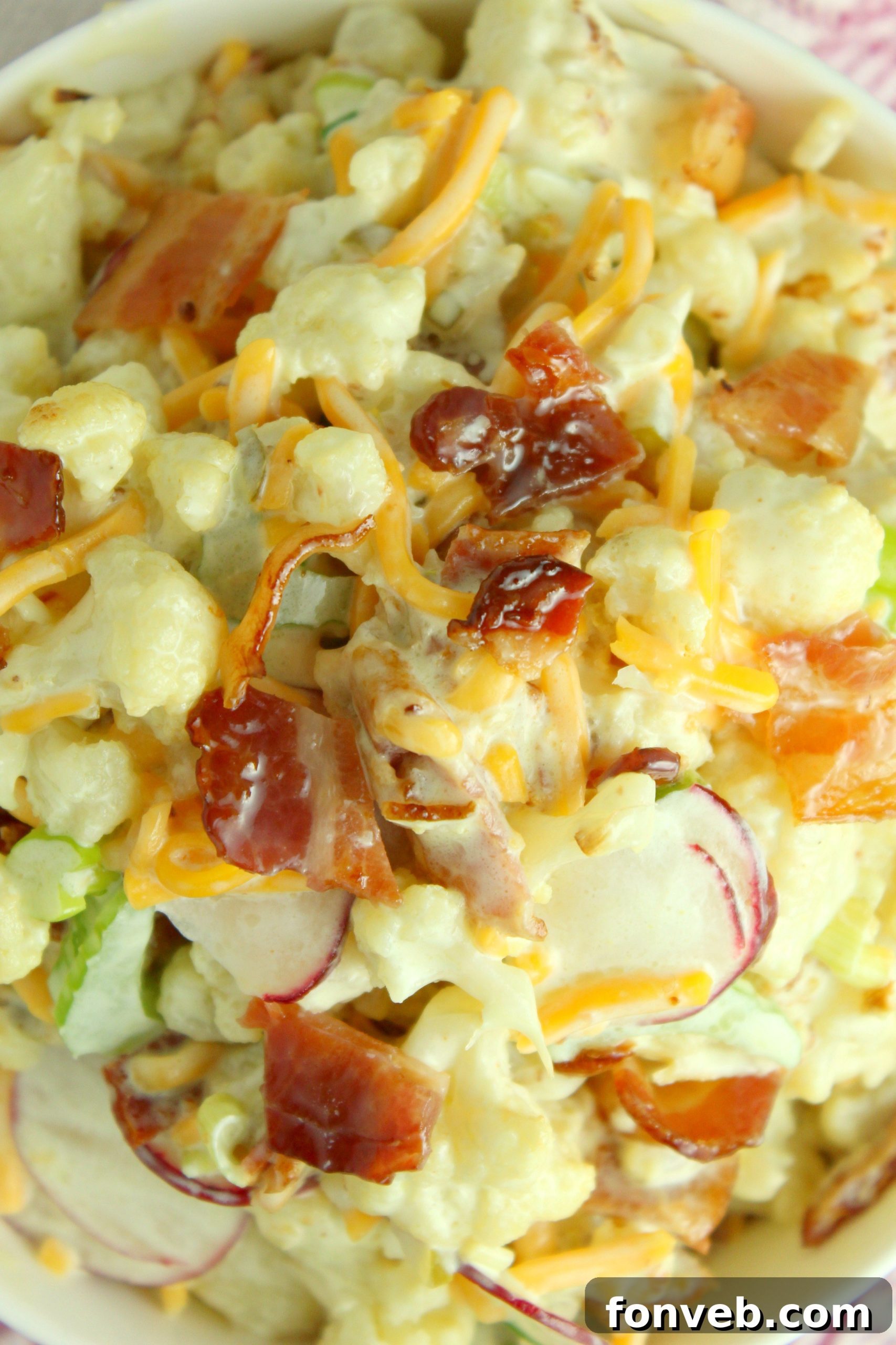 A final vibrant shot of the Loaded Cauliflower Salad with fresh herbs