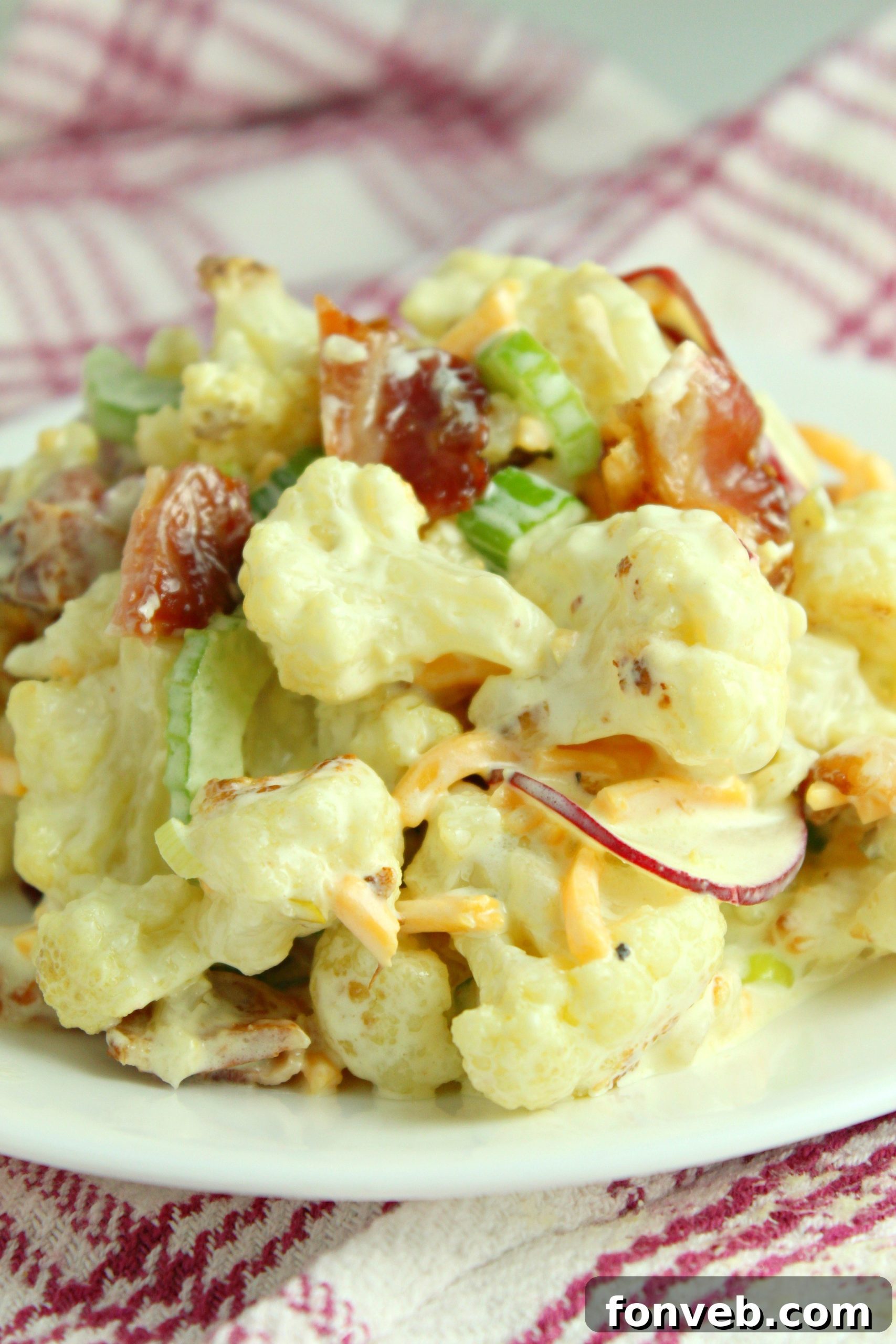 Freshly chopped green onions, a key garnish for the salad