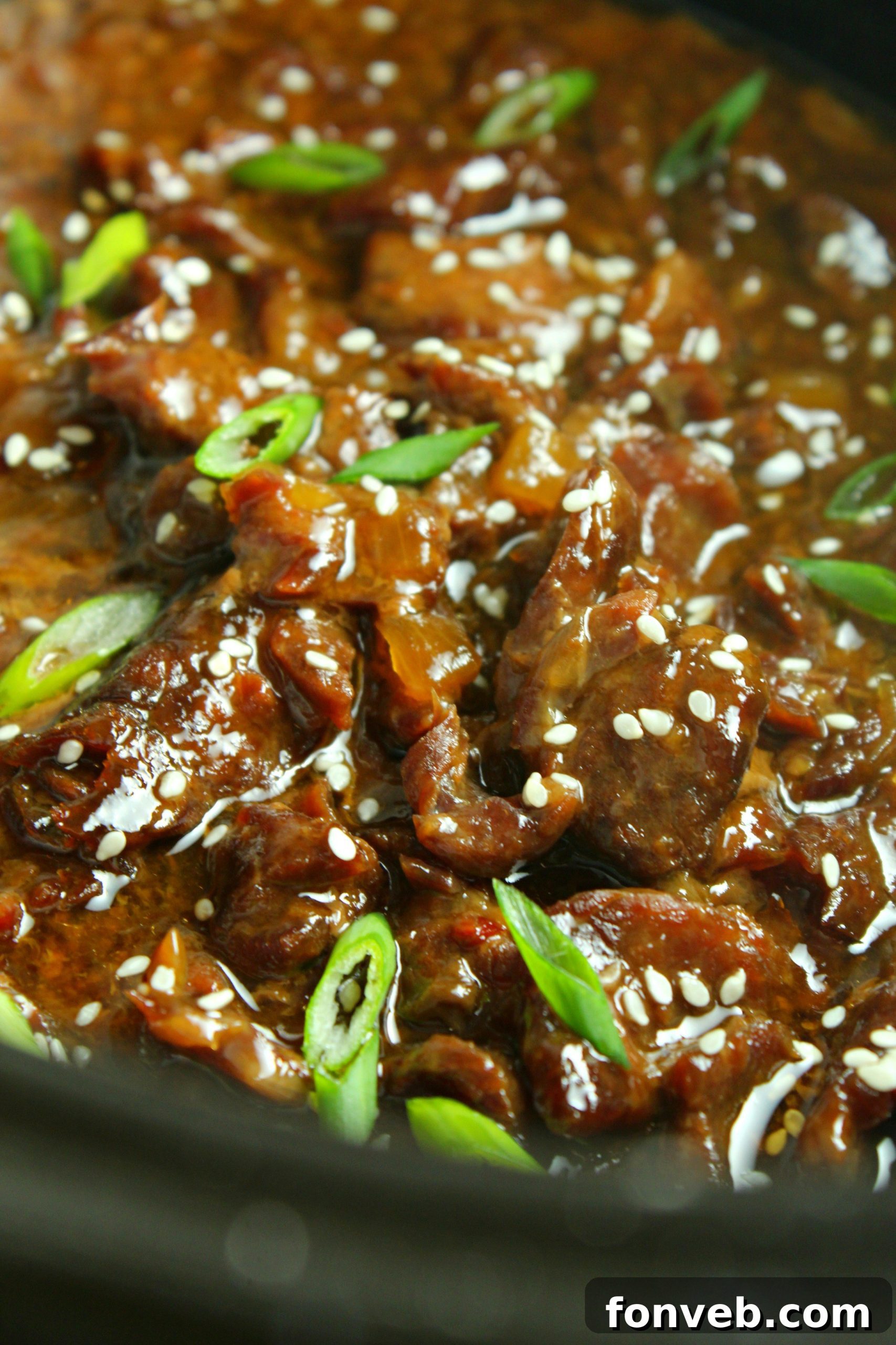 Slow Cooker Korean Beef with rice and garnishes