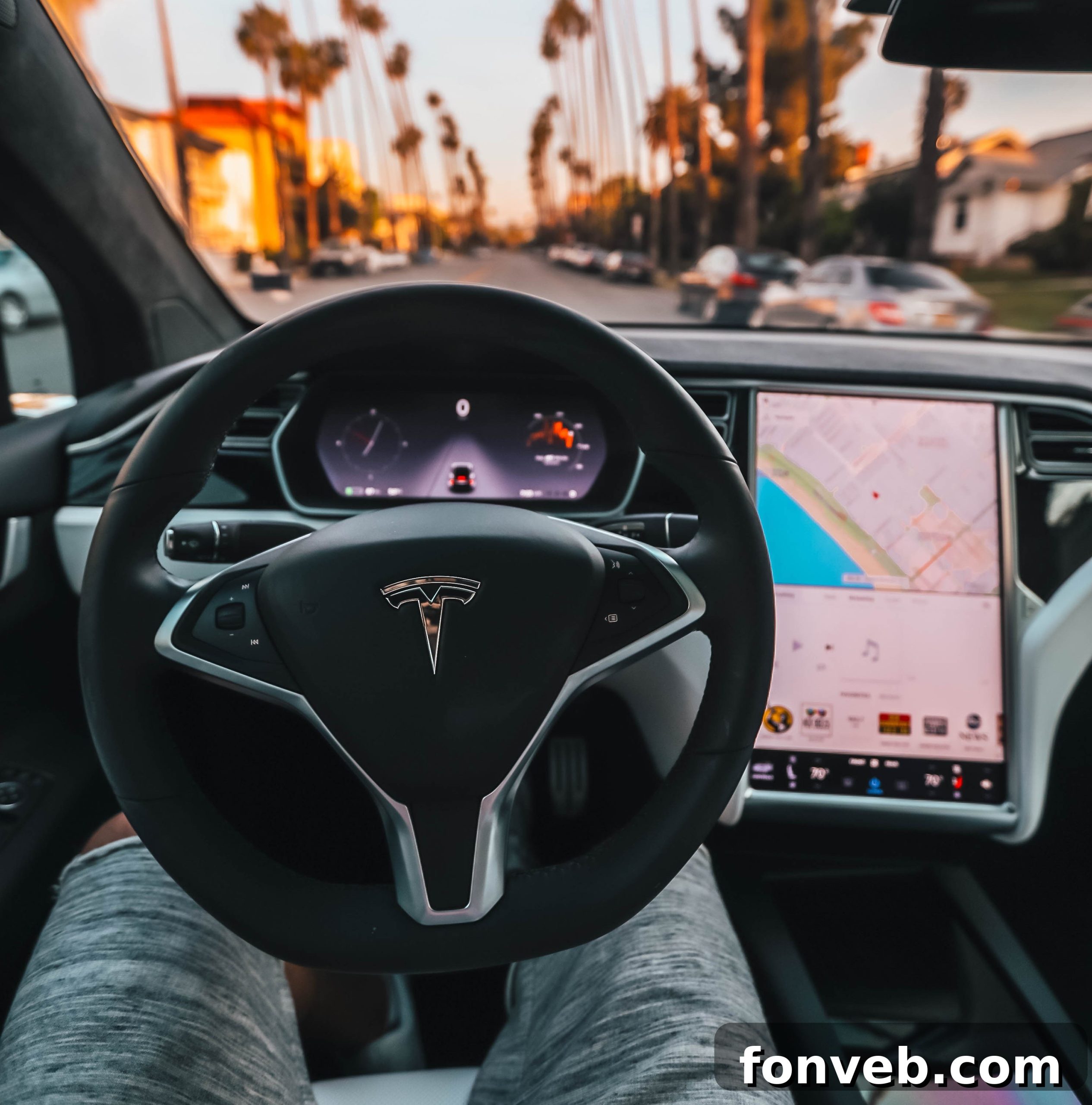 A short driver sitting too close to the steering wheel, indicating unsafe driving posture