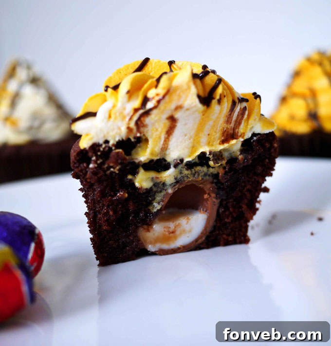 Creative PEEPS® chick surprise-inside cupcakes, revealing a marshmallow chick when cut open.