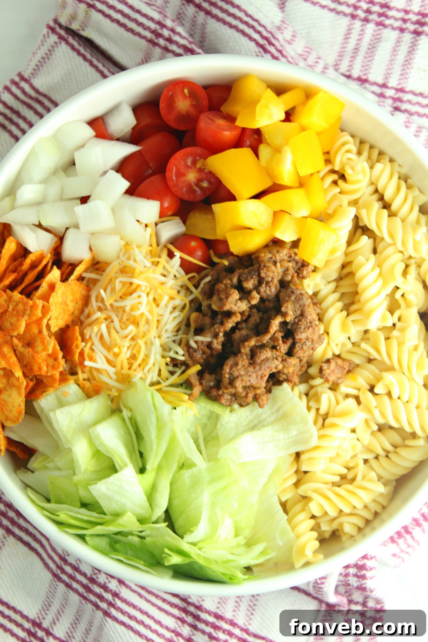 Overhead shot of Doritos Locos Taco Pasta Salad in a large serving bowl