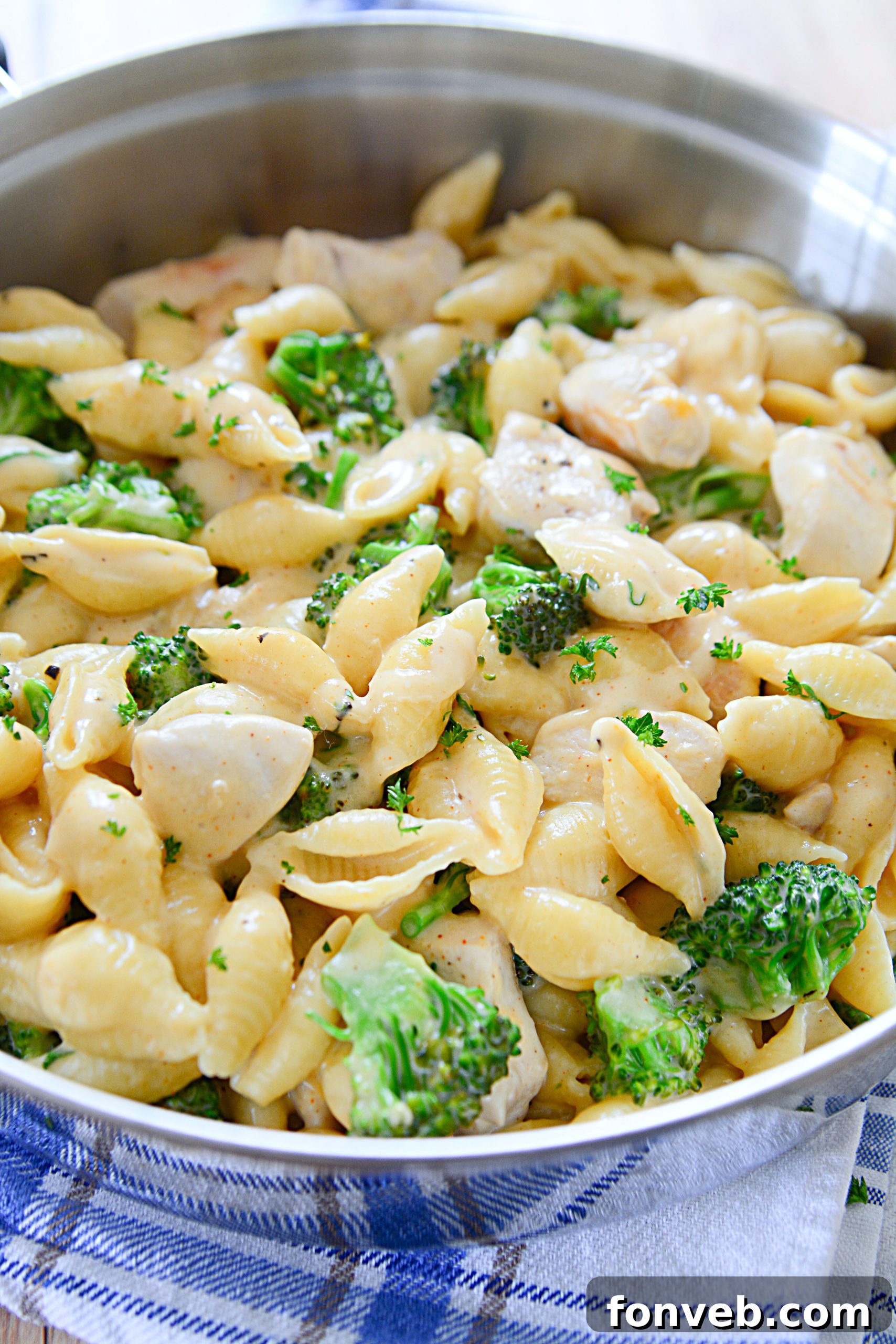 Creamy Cheesy Chicken and Broccoli Shells 6 A full spread featuring Cheesy Chicken & Broccoli Shells, a fresh green salad, and crusty garlic bread.