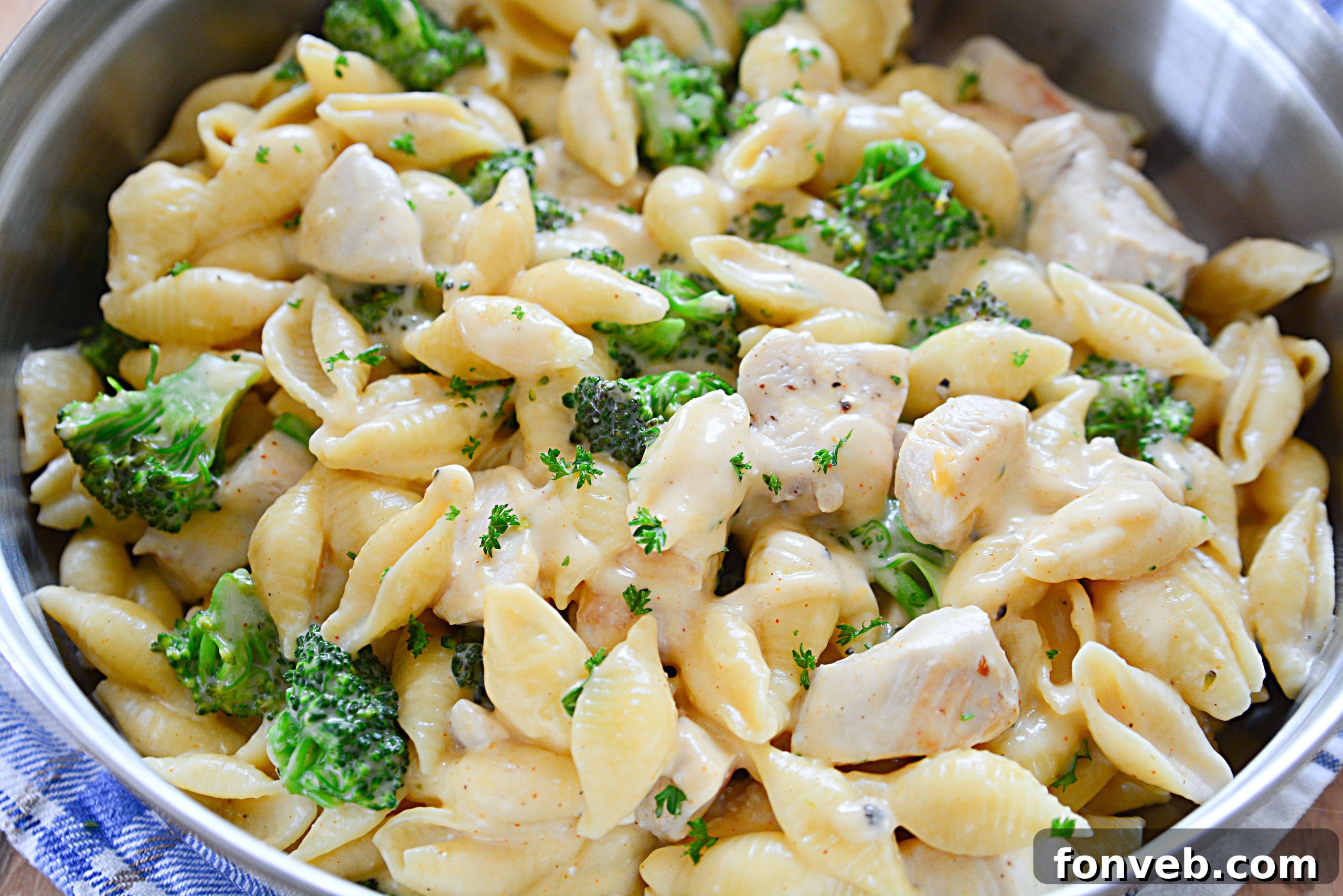 Creamy Cheesy Chicken and Broccoli Shells 7 Close-up of Cheesy Chicken & Broccoli Shells in a bowl, showing the rich, creamy sauce and perfectly cooked pasta.