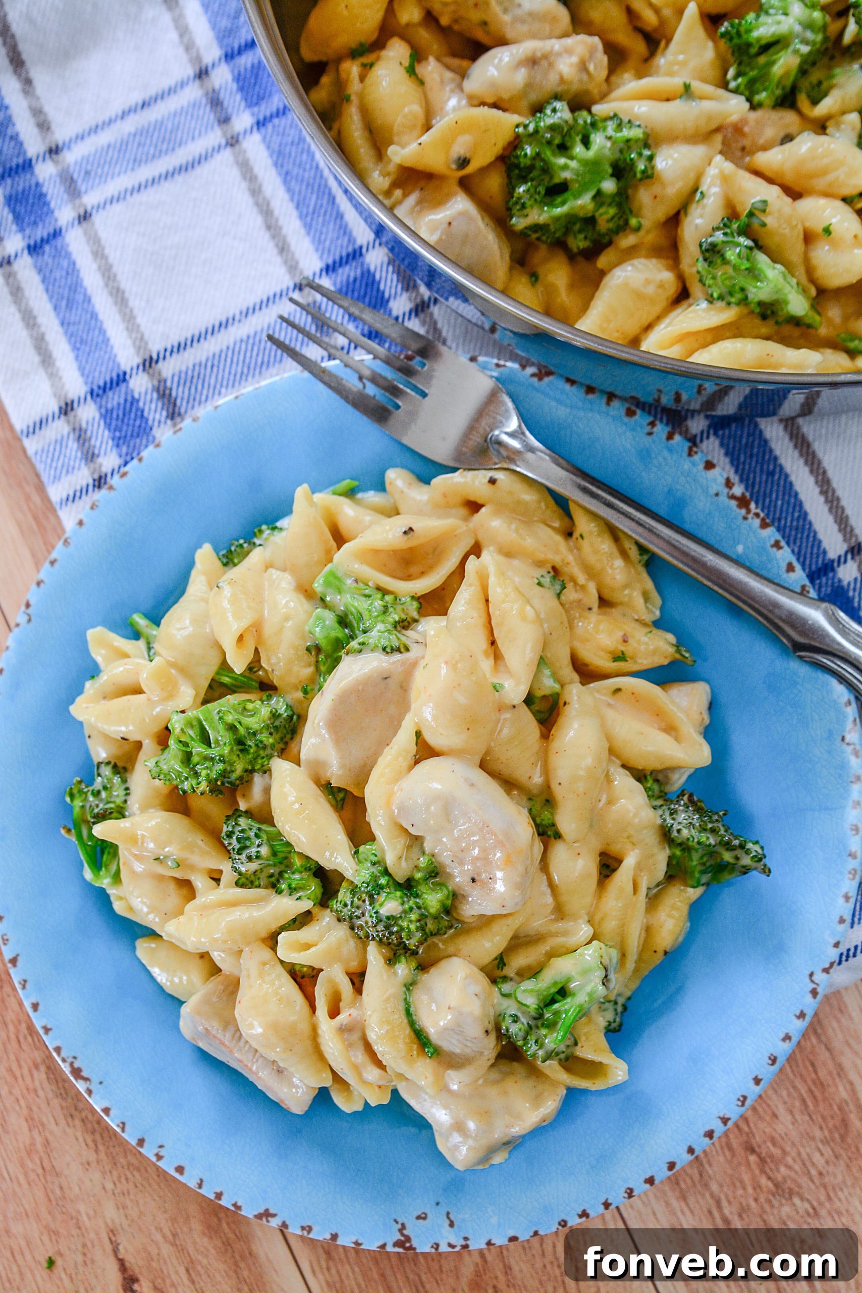 Creamy Cheesy Chicken and Broccoli Shells 9 A bowl of Cheesy Chicken & Broccoli Shells, half-eaten, showcasing its appetizing appeal even after some has been consumed.
