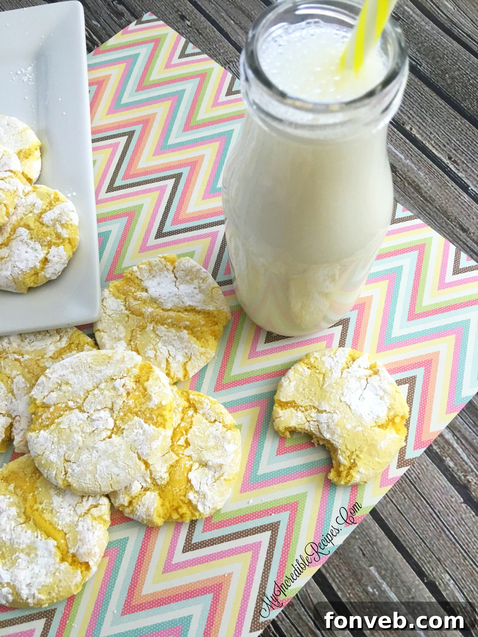 Zesty Lemon Crinkle Cookies 9 lem7 - Variety of cookies, including lemon and strawberry, on a white plate