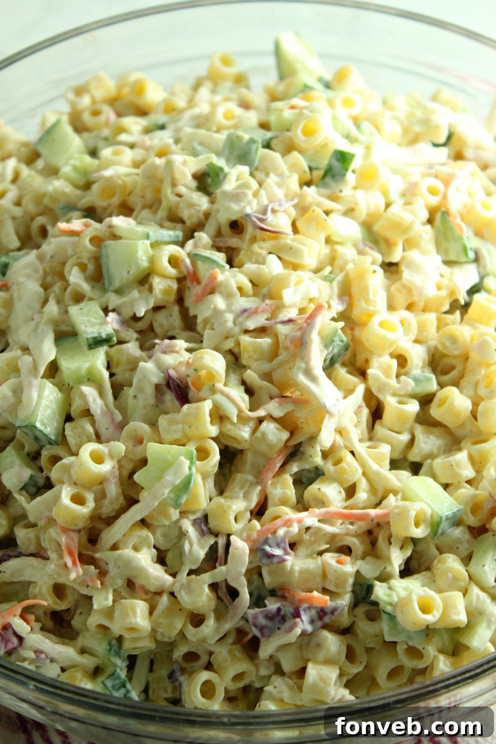 Coleslaw Pasta Salad with a focus on its creamy texture and fresh ingredients.
