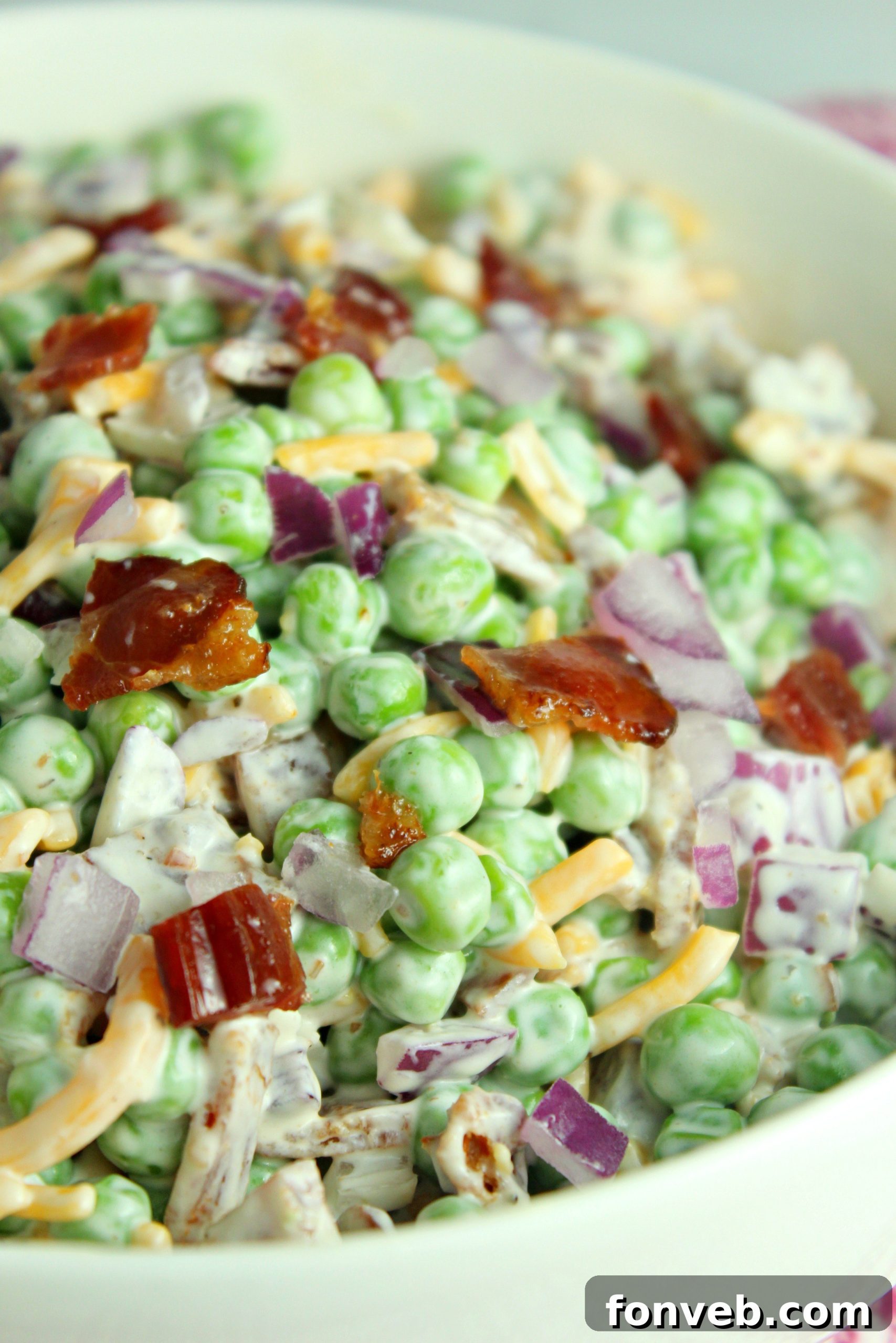 Smoky Bacon and Sweet Pea Salad 7 Overhead shot of Creamy Bacon Pea Salad, emphasizing its fresh ingredients and inviting appeal.