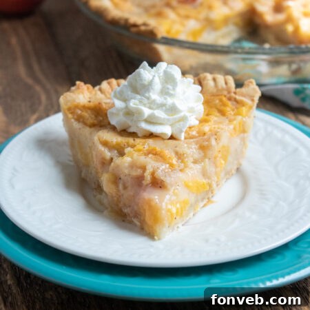 A perfectly baked Southern Peach Pie, showcased in a recipe card format with a golden crust and rich filling.