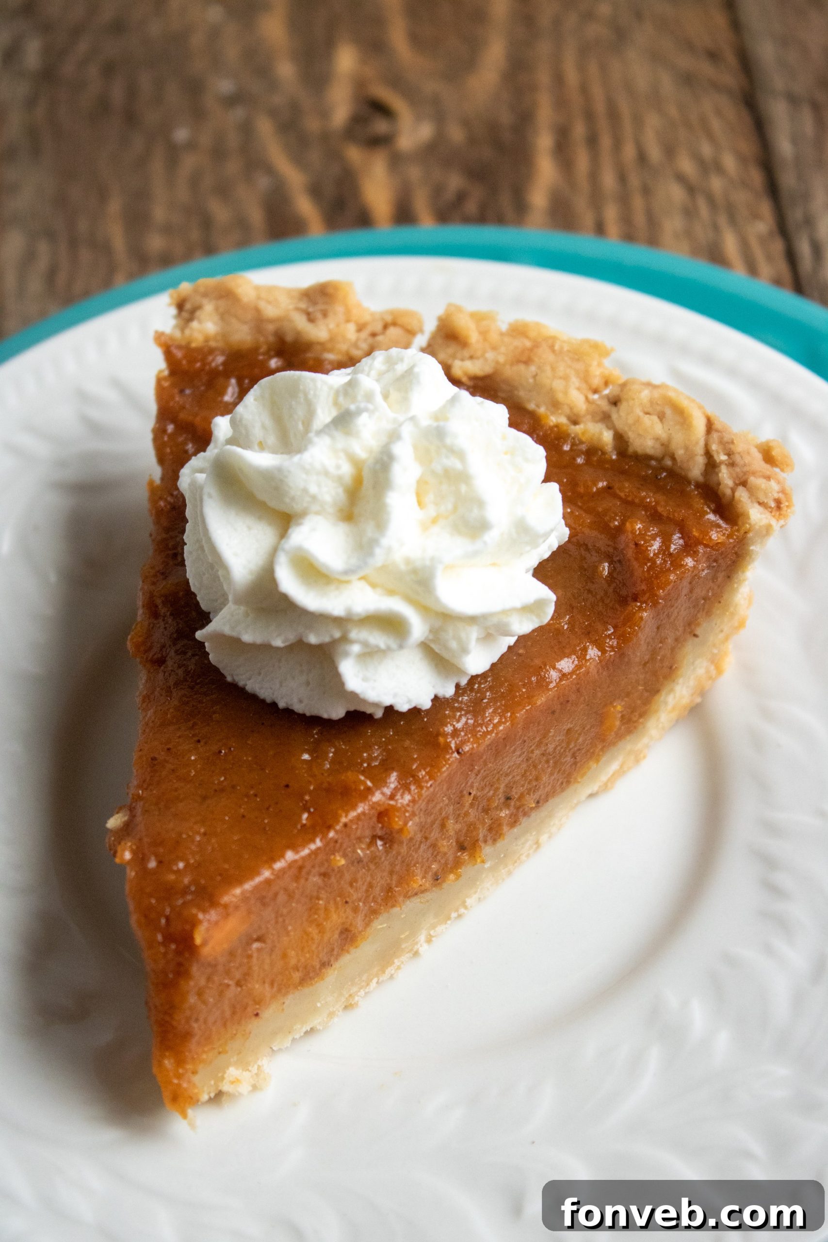 Another beautiful shot of a sweet potato pie, ready for a gathering