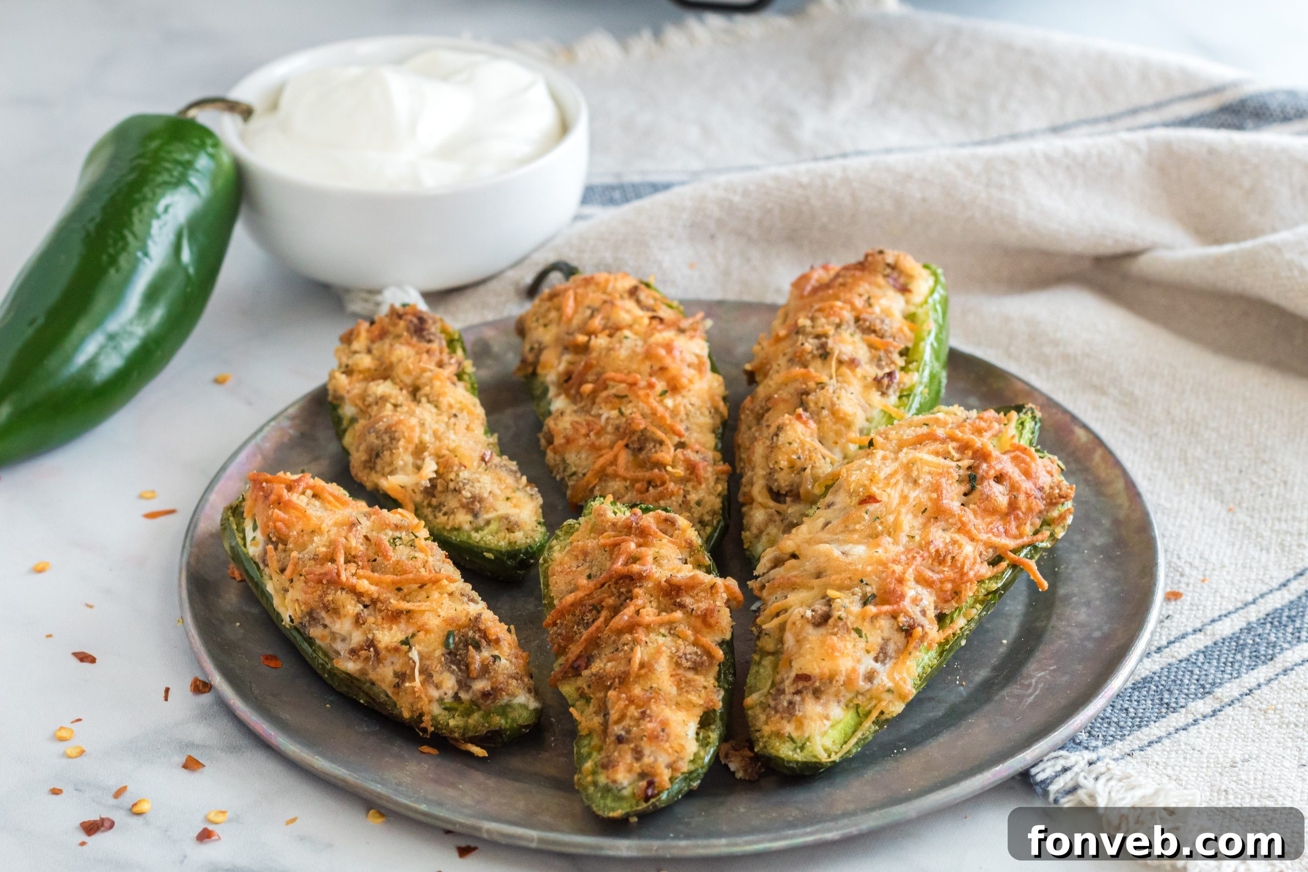 Air Fryer Jalapeno Poppers served on a wooden board