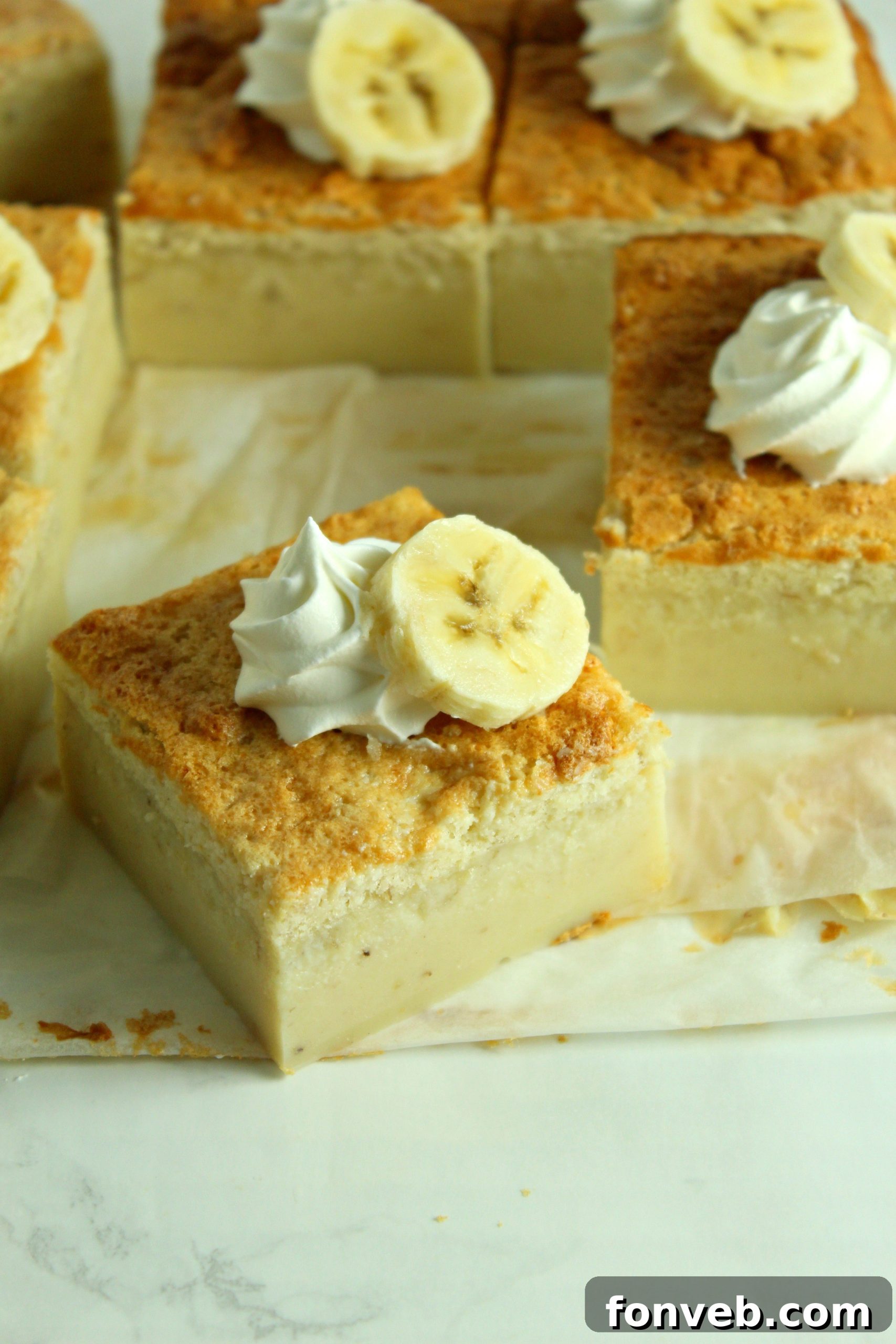 Banana Alchemy Cake 6 Several slices of Banana Magic Cake arranged artfully on a serving board.