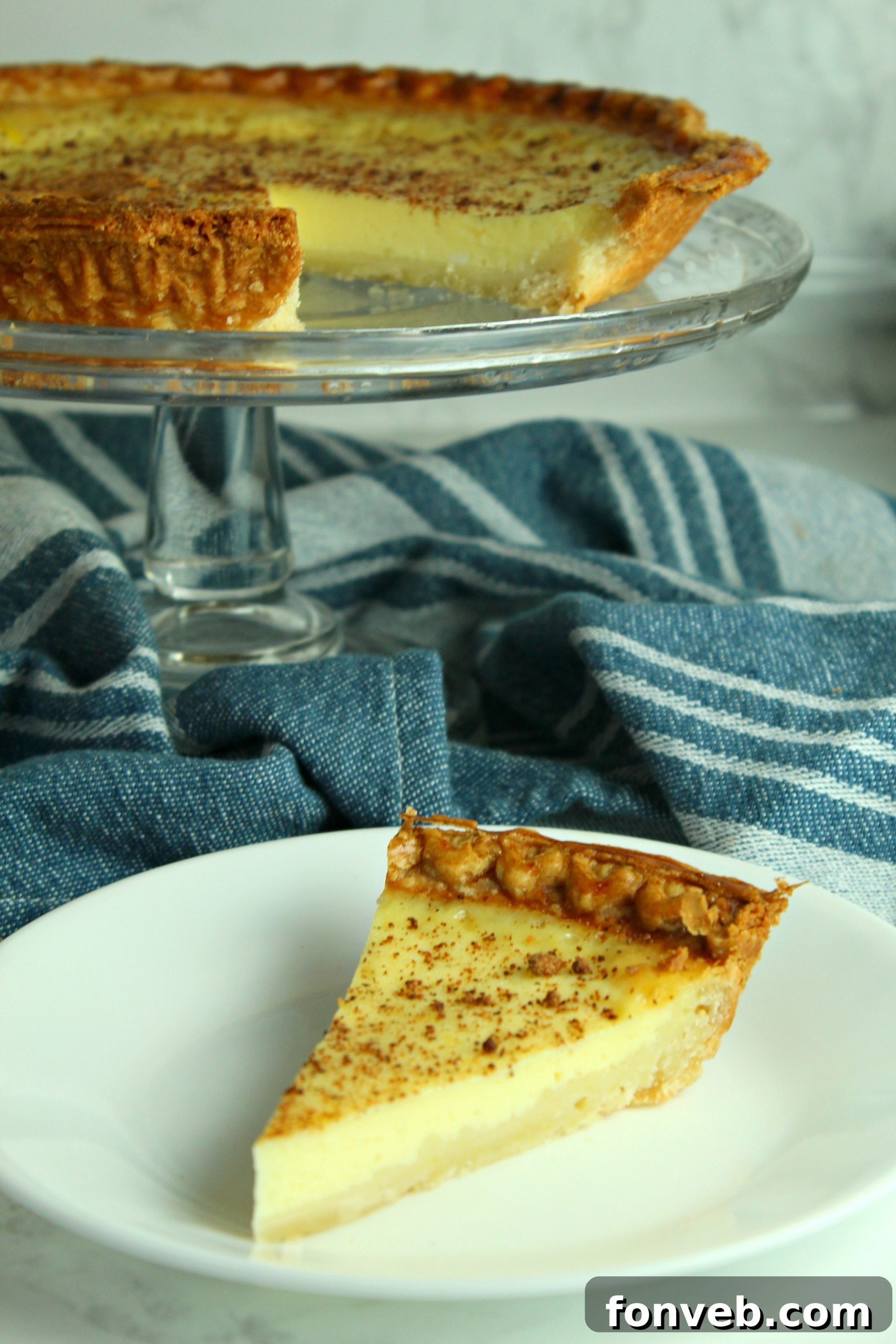 Another perspective of the creamy custard pie, highlighting its smooth surface and inviting aroma.