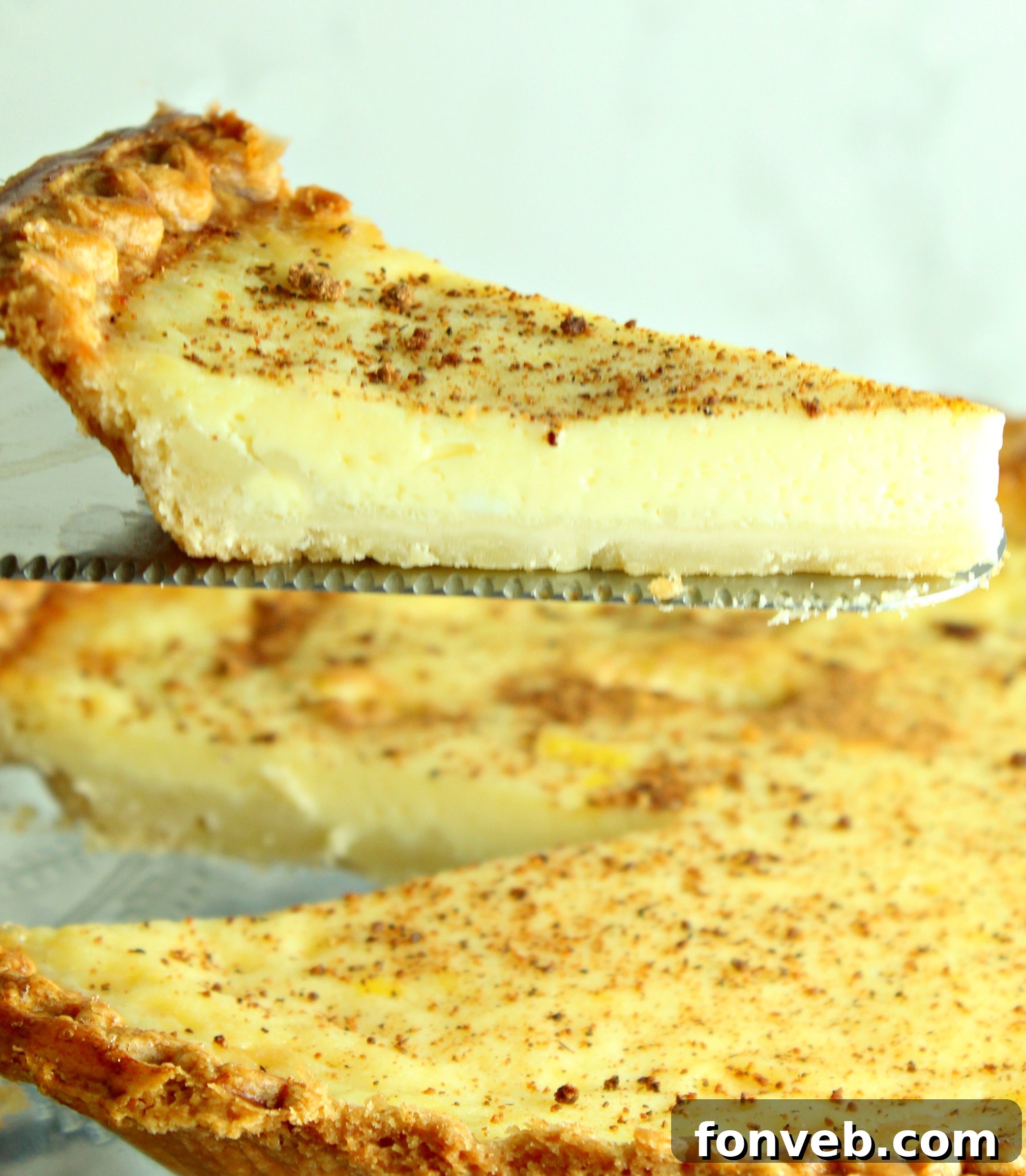 The final beautifully baked Old Fashioned Cream Custard Pie, garnished with a dusting of nutmeg, promising a delightful dessert experience.