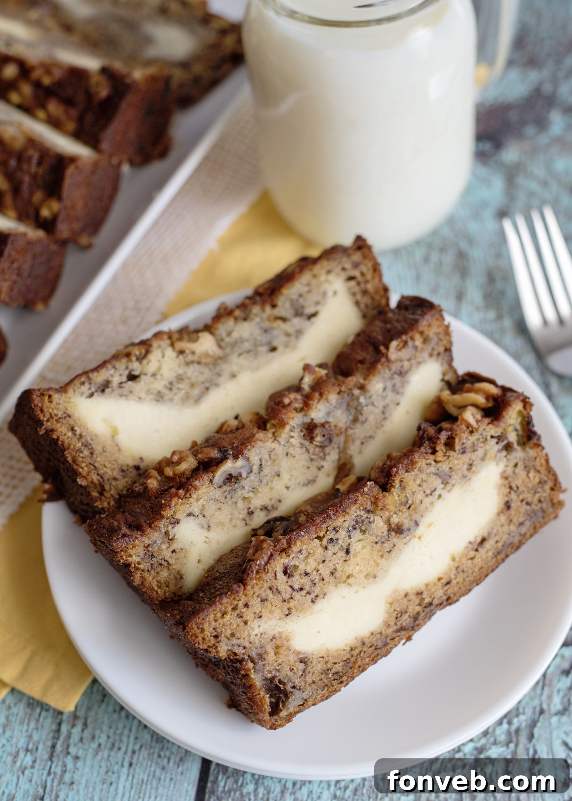 A close-up of a slice of Cream Cheese Banana Bread, showing texture.
