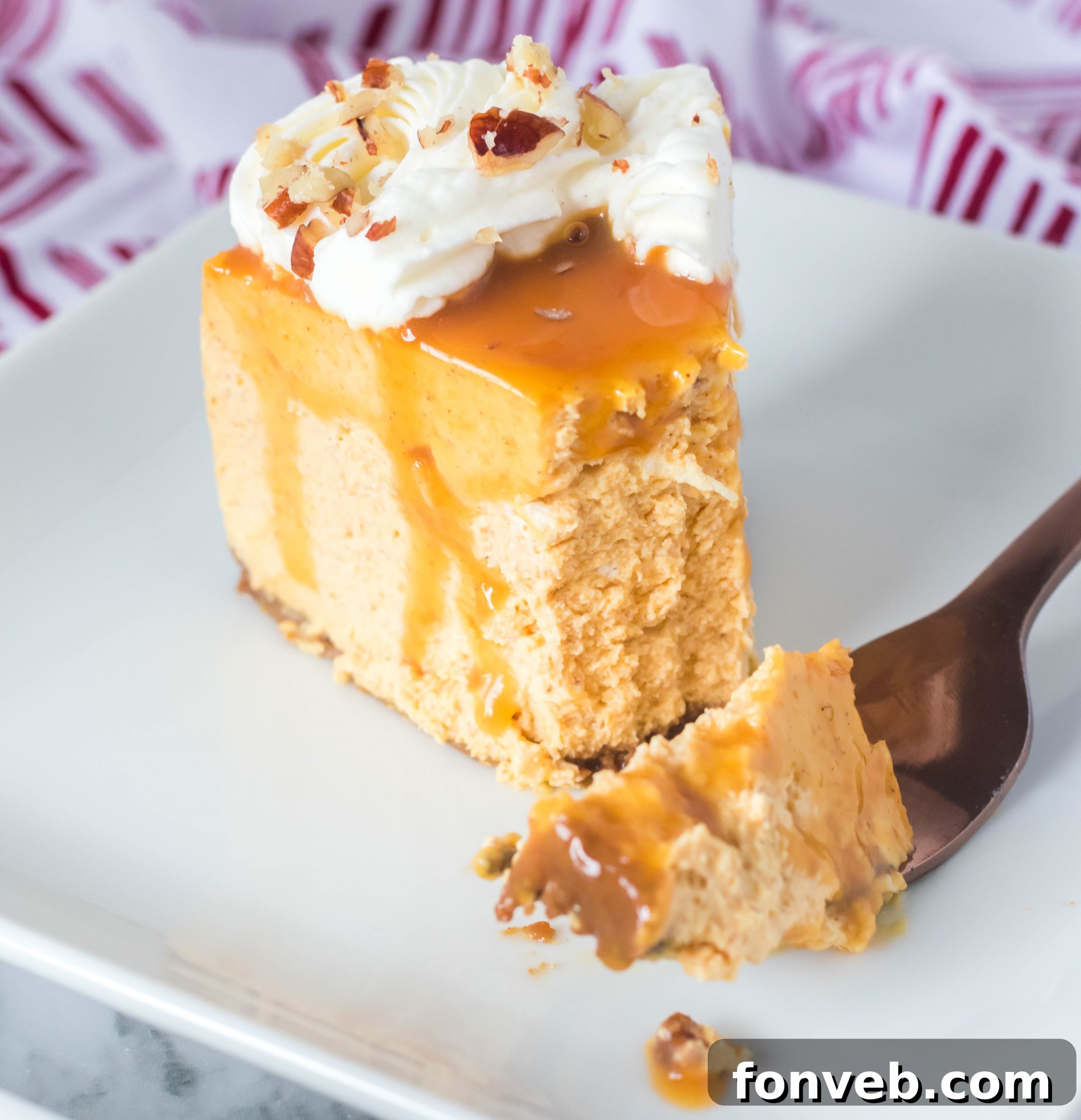 Mixing pumpkin cheesecake filling