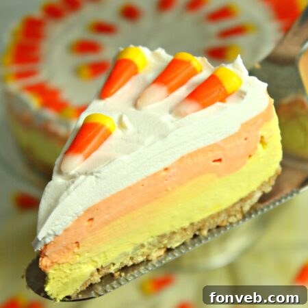 Effortless Autumn Candy Corn Cheesecake 10 Beautifully plated No Bake Candy Corn Cheesecake with candy corn garnish
