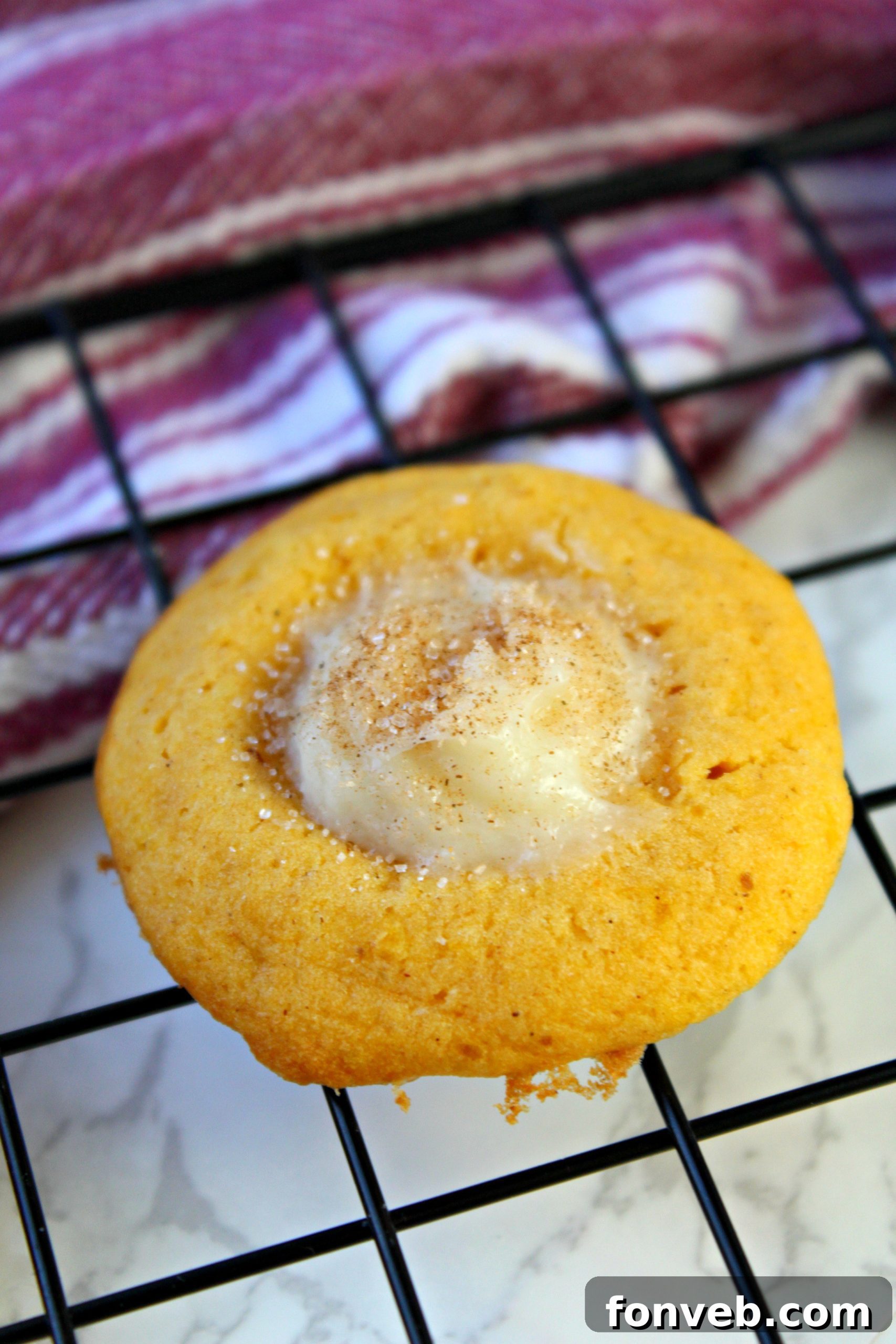 Pumpkin Cheesecake Thumbprint Cookies displayed on a serving platter, inviting and ready for enjoyment.
