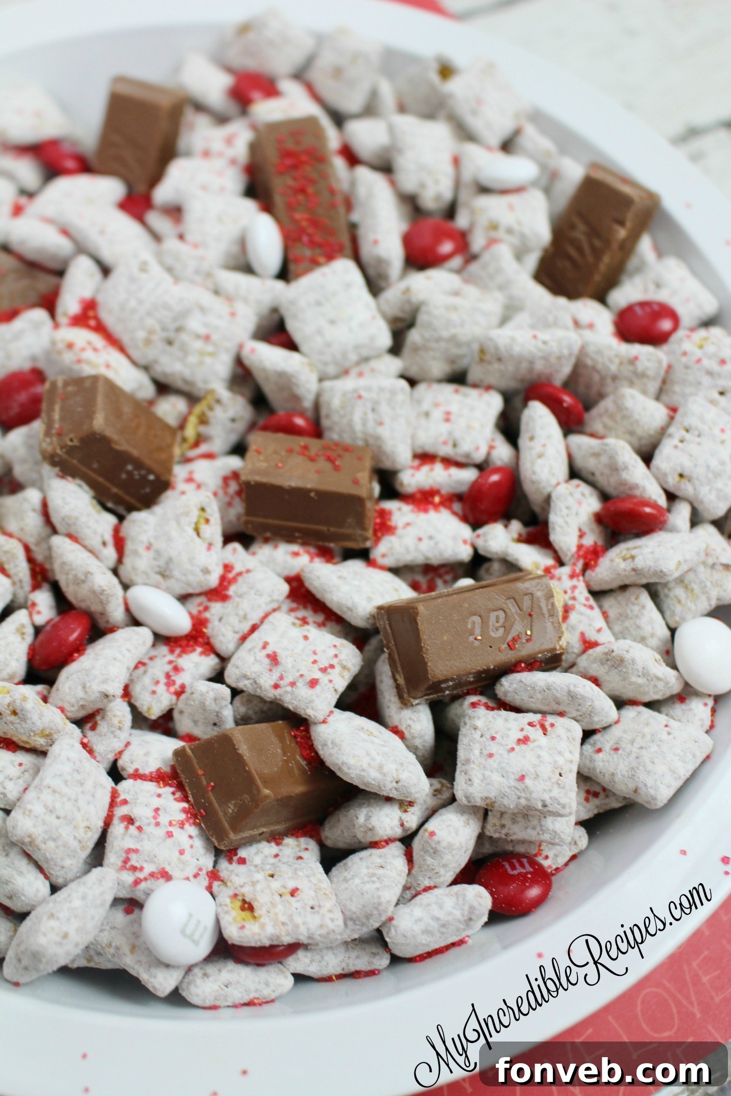 Sweetheart Kit Kat Muddy Buddies 4 A bowl of festive Muddy Buddies with Valentine's Day decorations